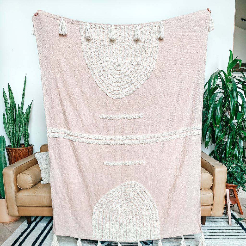 Blush Soft throw blanket with cream rainbow tufting design details